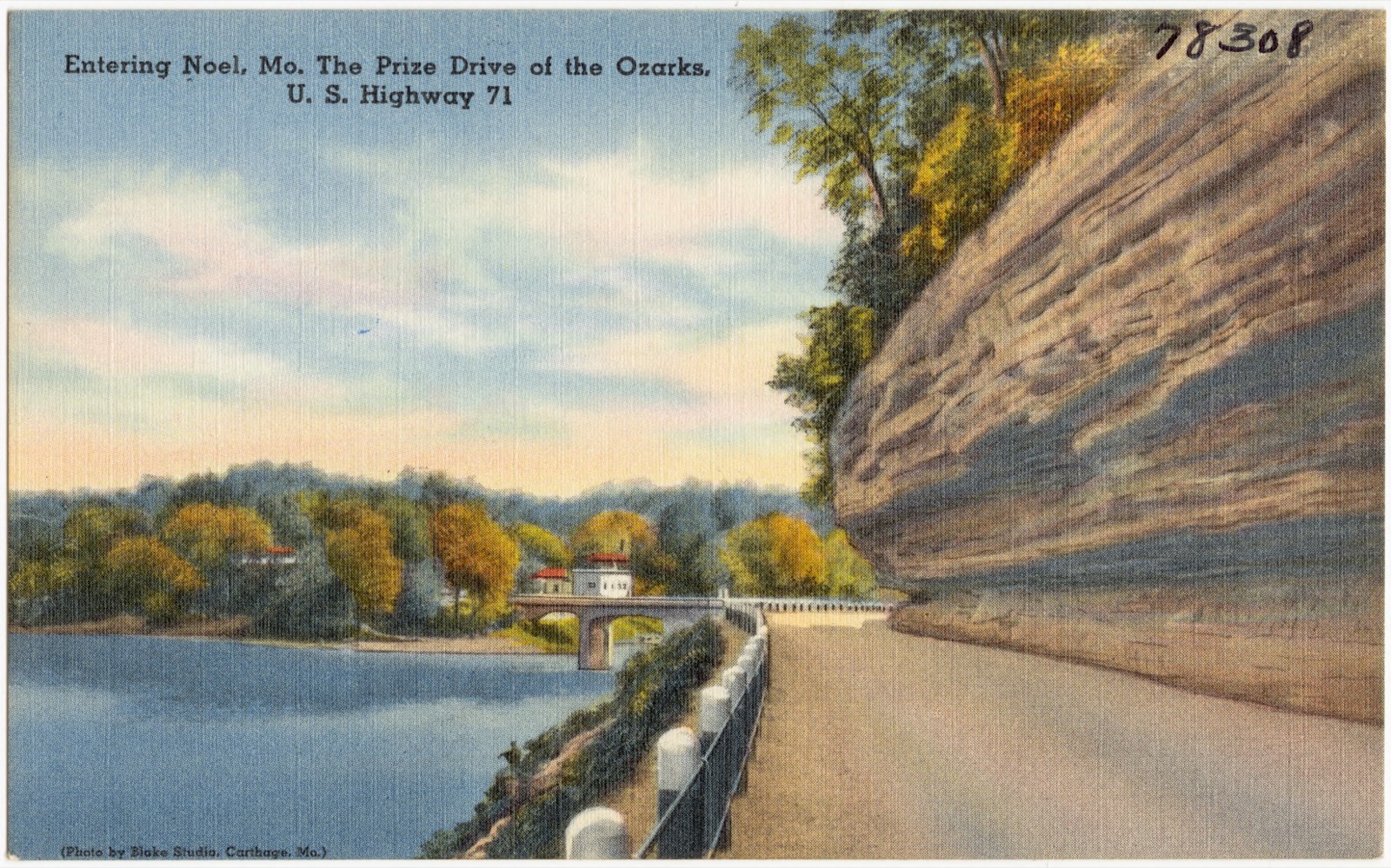 Historic linen postcard: a two-lane highway entering Noel, Missouri, through Ozark hills, U.S. Highway 71, circa 1930–1945.